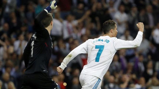 Ronaldo celebrates his 24th league goal while Kepa remonstrates with the officials