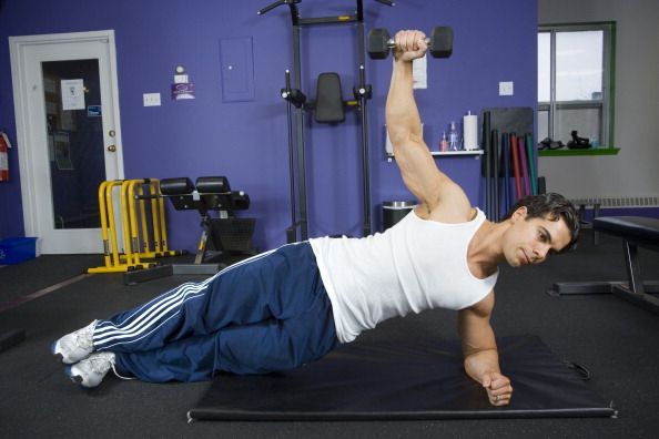 April 26 2007 Toronto: Start exercise 2: Twisting Side Plank. Alex Savva of CircuitFit shows three e