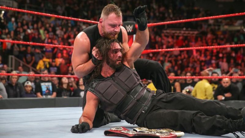 Resultado de imagem para Dean attacks Seth after tag team champion