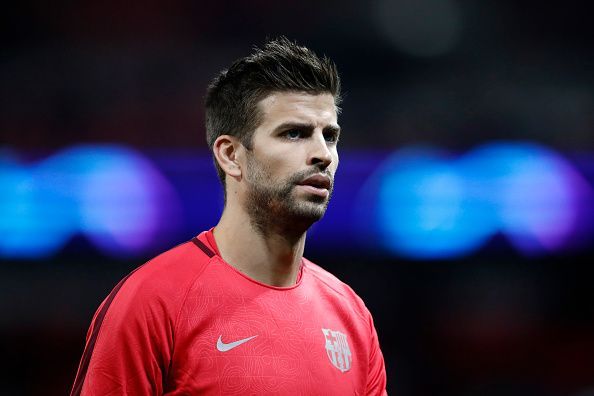 Gerard Pique memimpin pertahanan dari belakang