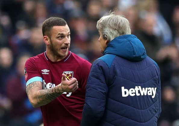 Marko Arnautovic (left) was frustrated after being hauled off early v Birmingham City last weekend with a back complaint