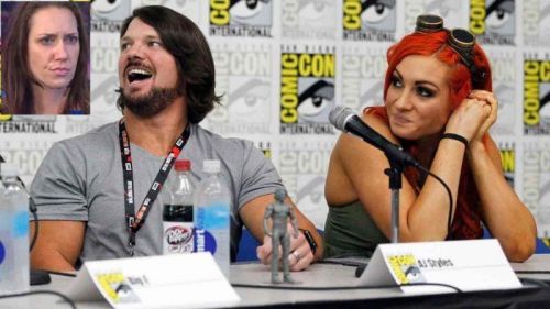  ] AJ Styles (left) with Becky Lynch (right) 
