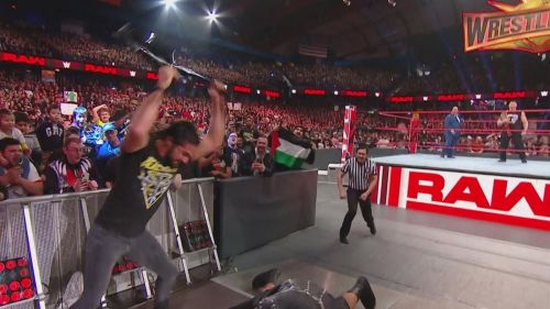 Rollins unloaded on McIntyre with a chair