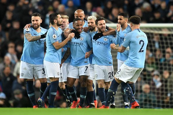 Manchester City players celebrate one of Sterling's strikes in an action-packed second-half