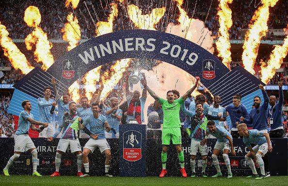 Manchester City players celebrate their FA Cup triumph but will be hoping for more success next year