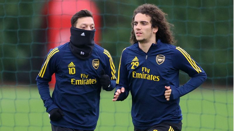 Mesut Ozil and Matteo Guendouzi - cropped
