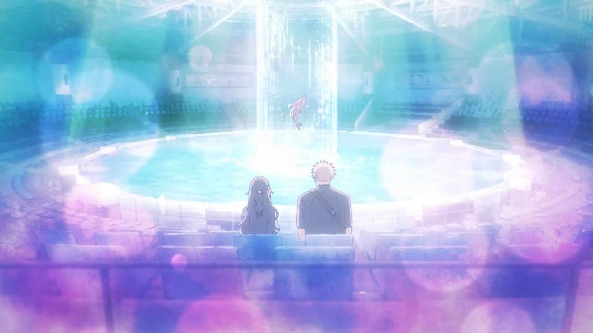 Kaoruko and Rintaro enjoy the dolphin show (Image via CloverWorks)