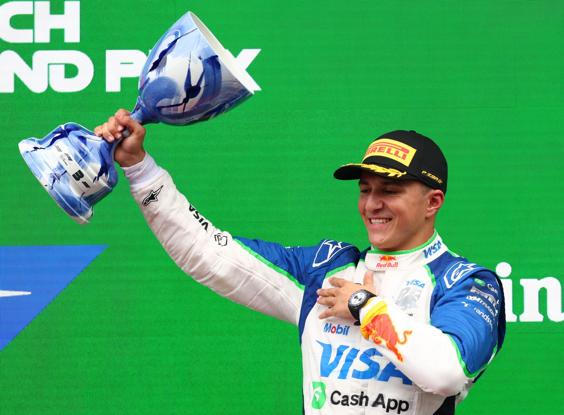 Watch: Isack Hadjar running to his team and jumping the barricade as he secures his first ever F1 podium at the Dutch GP