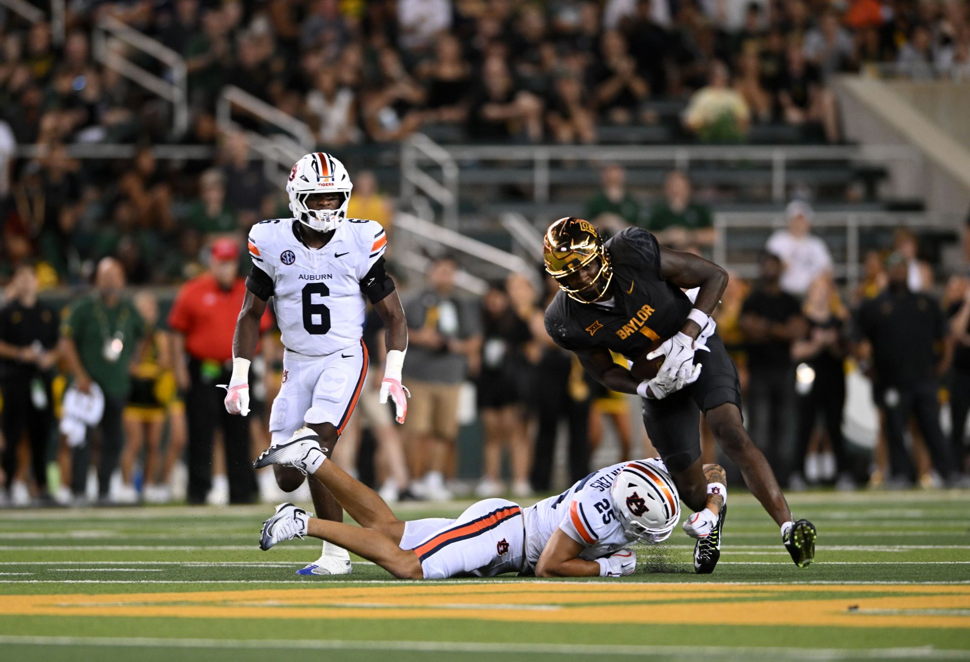 "Absolutely pathetic one-sided officiating" - CFB fans blast referees in Auburn vs. Baylor game after missing multiple penalties on Tigers 