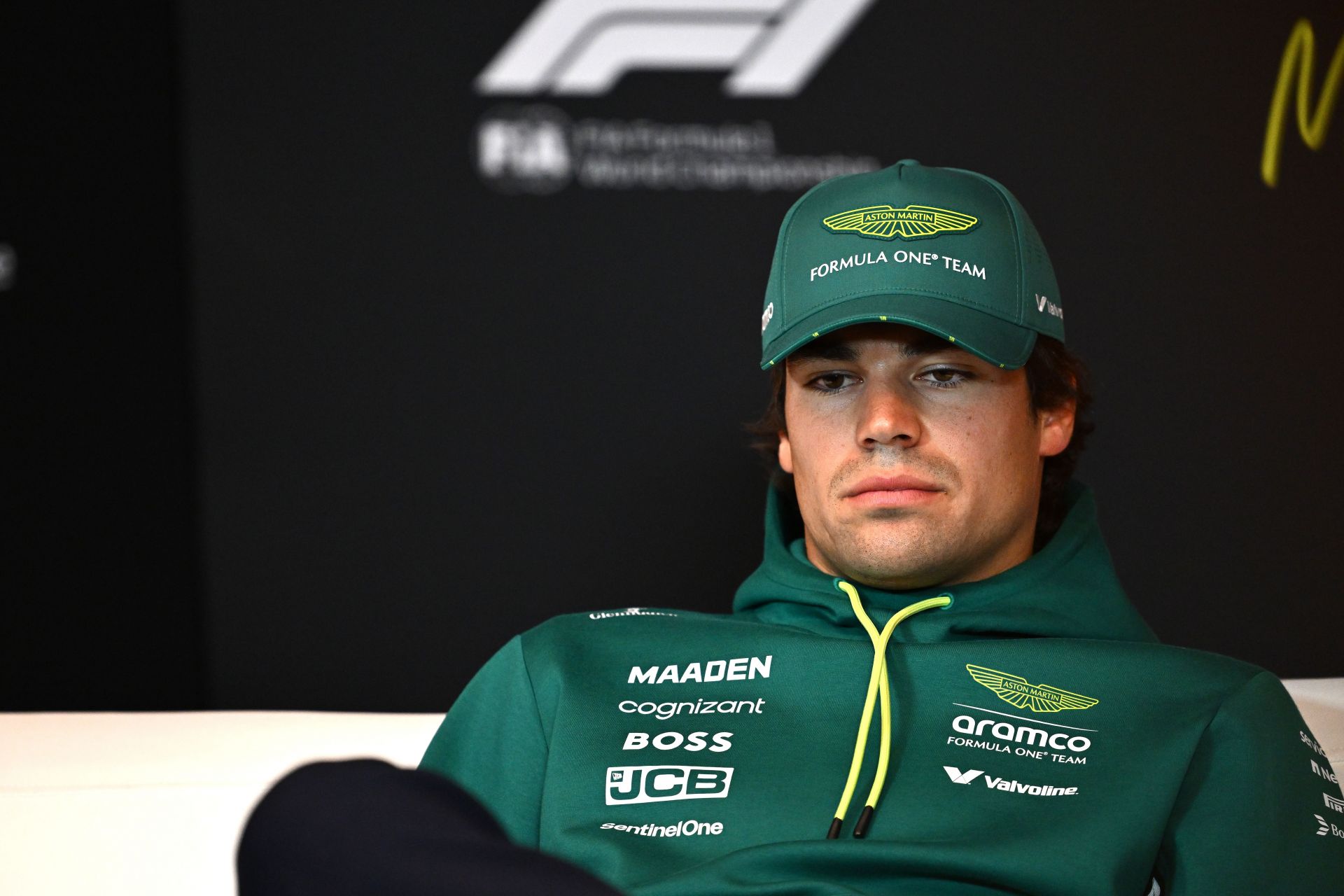 A frustrated Lance Stroll walks away mid-interview after another disastrous session