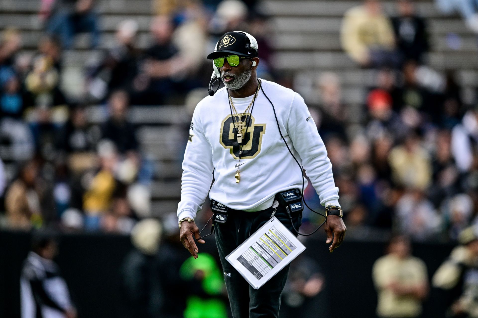 "Coach Prime literally p*****g money": CFB fans react as Deion Sanders gets portable toilet next to Colorado’s bench to help post bladder surgery