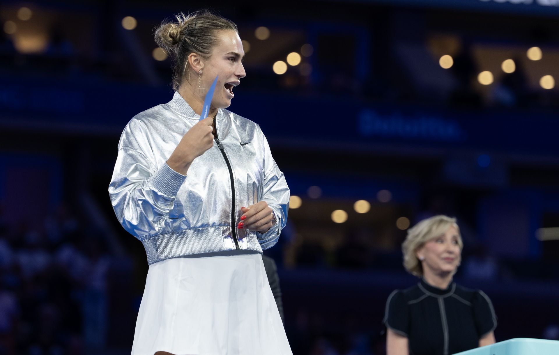WATCH: Aryna Sabalenka refuses to let go of $5 million winner's check at US Open after earning biggest payday of her career