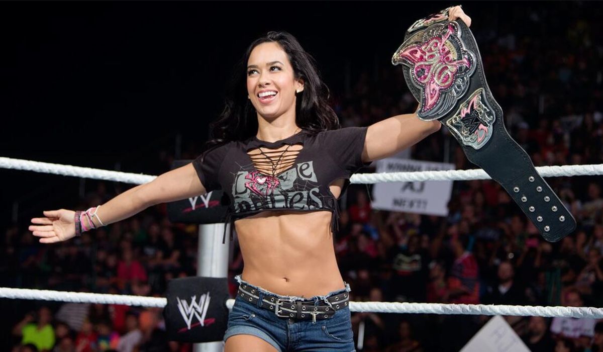 Why did AJ Lee leave WWE?