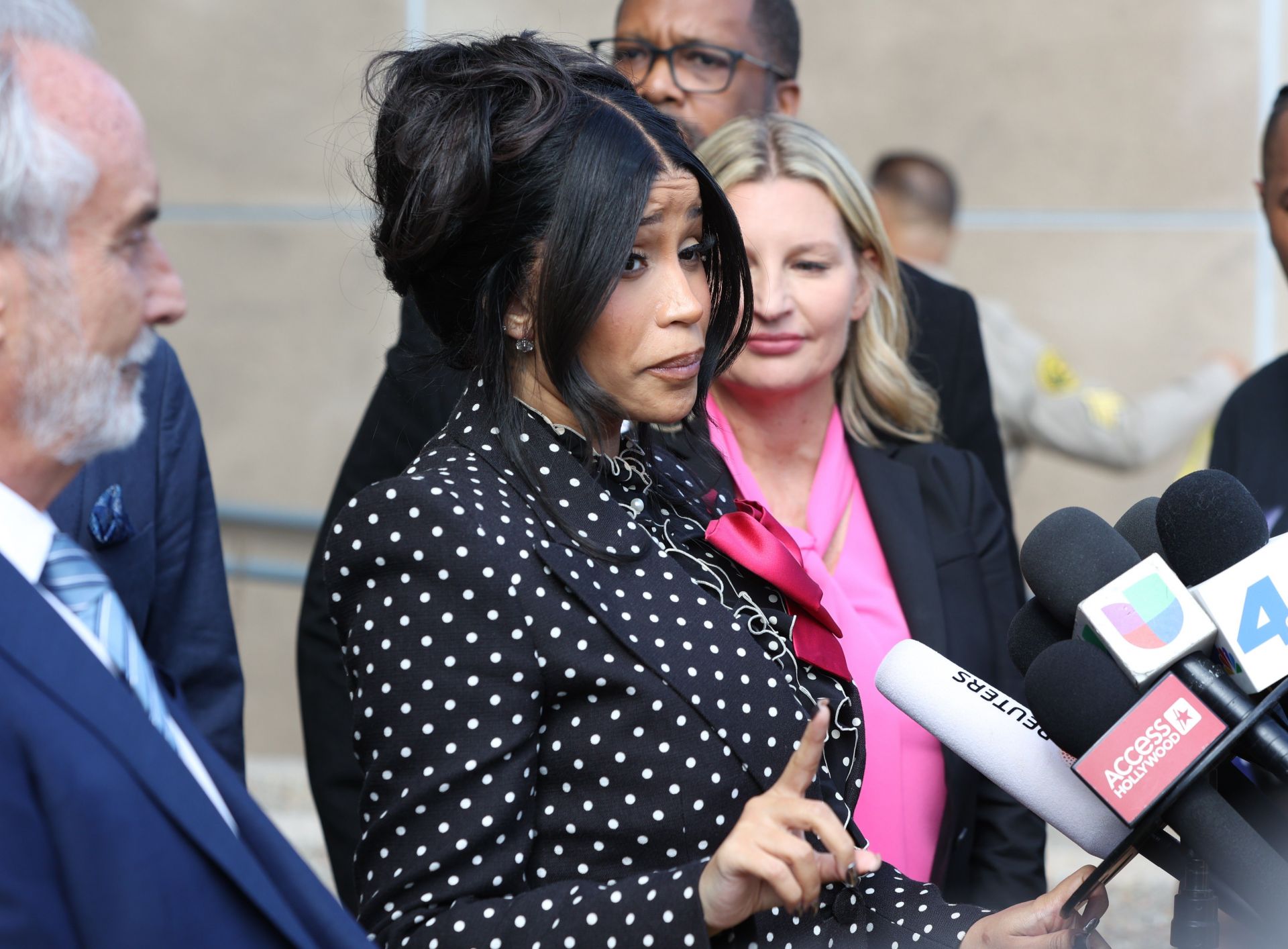“Going to get sued for copyright now”: Netizens react as Cardi B drops "AM I THE DRAMA?" CD’s featuring her viral courtroom looks