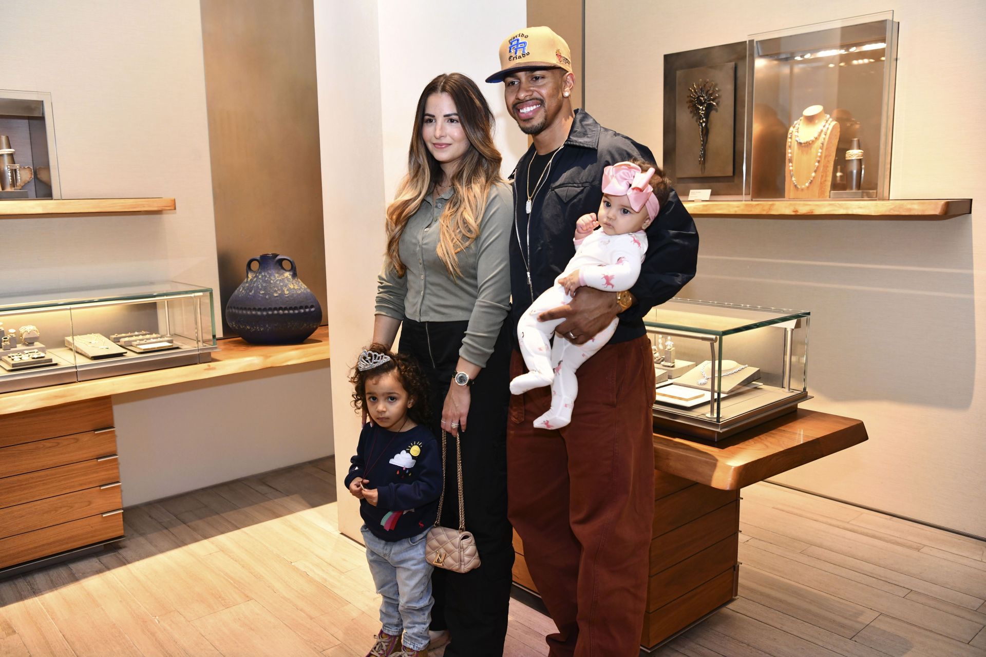 Francisco Lindor's wife, Katia, oozes confidence in red bikini top and flared pants look accented with $3,350 Louis Vuitton arm candy