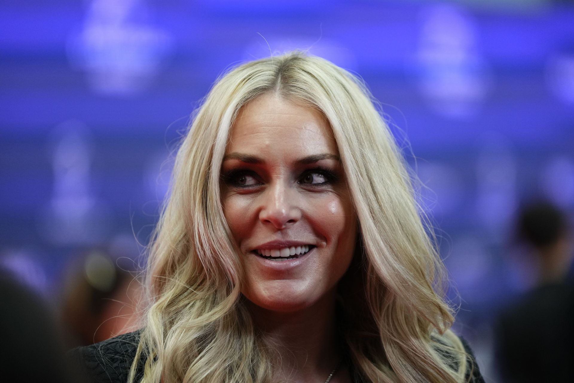 Lindsey Vonn poses in all-white fit as she celebrates Carlos Alcaraz's victory at US Open 2025