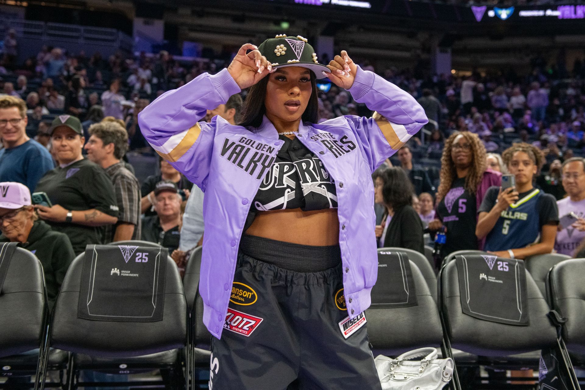 Jordan Chiles poses in customized fit as she cheers on Golden State Valkyries after DWTS Season 34 cast reveal