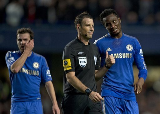 Chelsea's John Obi Mikel (R) talks with referee Mark Clattenburg Chelsea's John Obi Mikel (R) talks with referee Mark Clattenburg