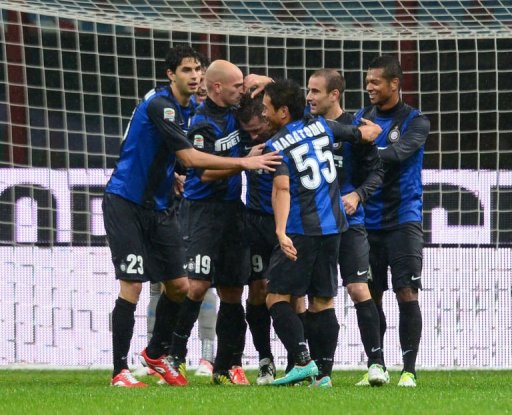 Inter Milan's players celebrate scoring Inter Milan's players celebrate scoring