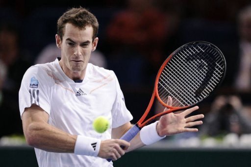 Britain's Andy Murray returns the ball to Poland's Jerzy Janowicz Britain's Andy Murray returns the ball to Poland's Jerzy Janowicz
