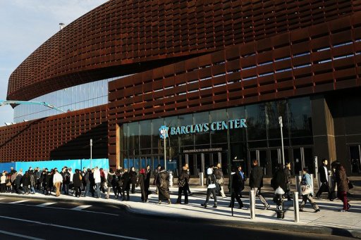 Thousands of people wait to board city buses into Manhattan at the newly opened Barclay's Center in Brooklyn Thousands of people wait to board city buses into Manhattan at the newly opened Barclay's Center in Brooklyn