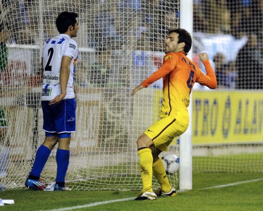 Barcelona's midfielder Cesc Fabregas celebrates after scoring Barcelona's midfielder Cesc Fabregas celebrates after scoring