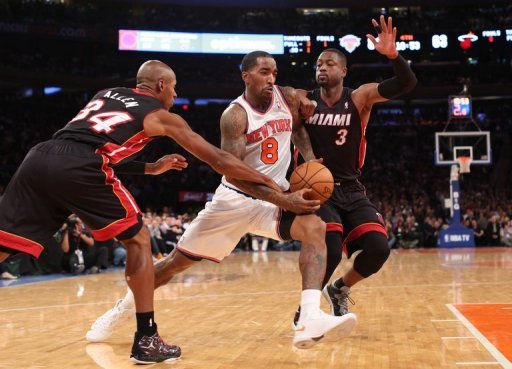 A packed house in famed Madison Square Garden cheered the Knicks in their season opener against the Heat A packed house in famed Madison Square Garden cheered the Knicks in their season opener against the Heat