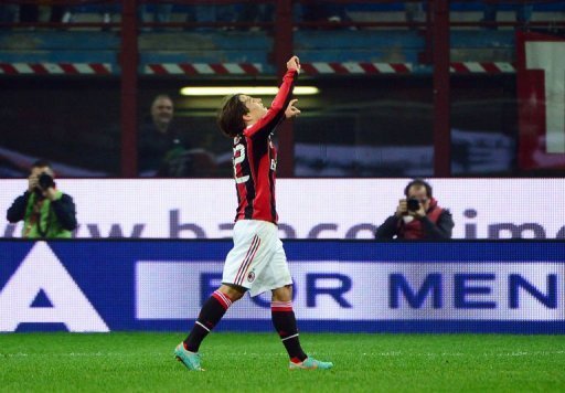 AC Milan's forward Bojan Krkic (C) celebrates after scoring AC Milan's forward Bojan Krkic (C) celebrates after scoring