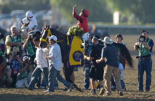Jockeys Willie Martinez on Trinniberg celebrates after the Breeders' Cup Sprint Jockeys Willie Martinez on Trinniberg celebrates after the Breeders' Cup Sprint