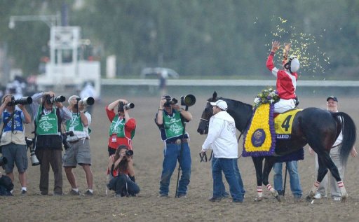 Jockey Brian Hernandez on Fort Larned celebrates his victory at the Breeders' Cup Classic Jockey Brian Hernandez on Fort Larned celebrates his victory at the Breeders' Cup Classic