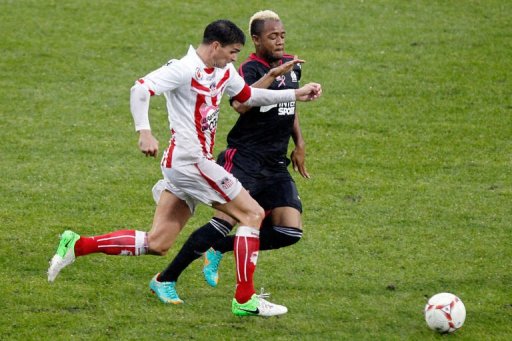 Ajaccio's Carl Medjani (L) vies with Marseille's Jordan Ayew Ajaccio's Carl Medjani (L) vies with Marseille's Jordan Ayew