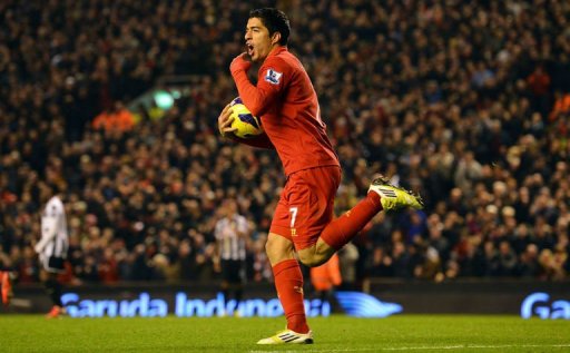 Liverpool's Luis Suarez celebrates scoring Liverpool's Luis Suarez celebrates scoring