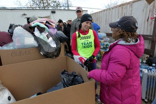 After running nearly 20 miles, Joselyn Fine lent a hand to a group of volunteers just off South Beach After running nearly 20 miles, Joselyn Fine lent a hand to a group of volunteers just off South Beach