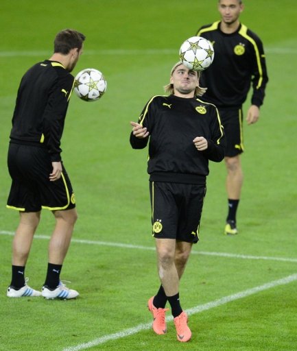 Dortmund currently top Group D on seven points with Real a point behind Dortmund currently top Group D on seven points with Real a point behind