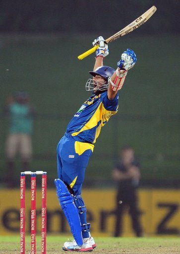 Sri Lankan cricketer Tillakaratne Dilshan raises his bat and helmet in celebration after scoring a century Sri Lankan cricketer Tillakaratne Dilshan raises his bat and helmet in celebration after scoring a century