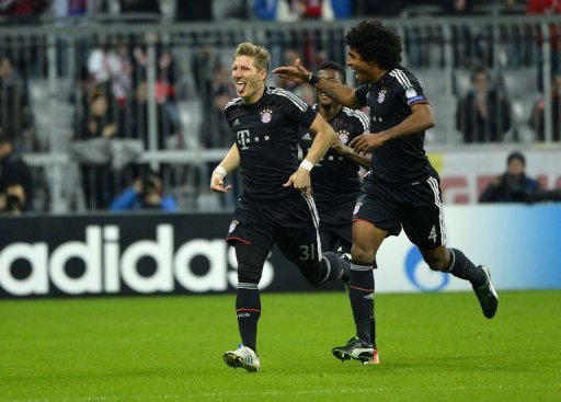Bayern Munich's Bastian Schweinsteiger (L) celebrates scoring with his teammate Dante Bayern Munich's Bastian Schweinsteiger (L) celebrates scoring with his teammate Dante