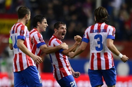 Emre (C) will play for Atletico in their Europa League game at Academica on Thursday Emre (C) will play for Atletico in their Europa League game at Academica on Thursday
