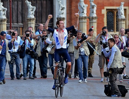Wiggins celebrates winning the Olympic gold in London in August Wiggins celebrates winning the Olympic gold in London in August