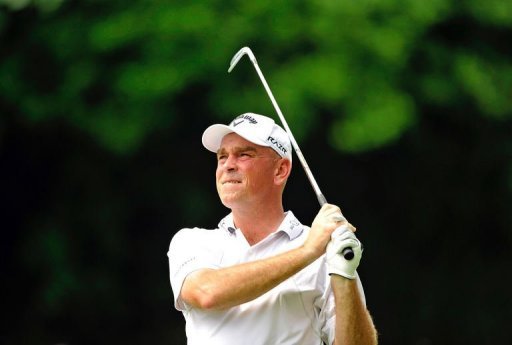 Thomas Bjorn of Denmark hits a shot on day one of the Singapore Open Thomas Bjorn of Denmark hits a shot on day one of the Singapore Open