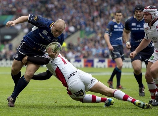 Leinster's South Africa-born Richardt Strauss (L) is tackled during the European Cup final in May Leinster's South Africa-born Richardt Strauss (L) is tackled during the European Cup final in May