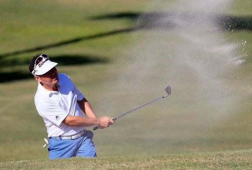 Charlie Wi of South Korea plays a shot on the 11th hole Charlie Wi of South Korea plays a shot on the 11th hole