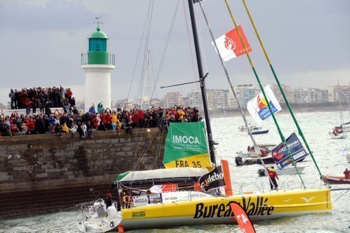 The monohull 'Bureau Valle' skippered by Louis Burton leaves the harbour in Les Sables d'Olonne, France The monohull 'Bureau Valle' skippered by Louis Burton leaves the harbour in Les Sables d'Olonne, France