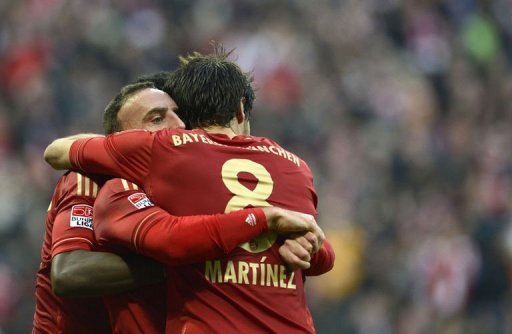 Bayern players celebrate a goal during the German first division match against Eintracht Frankfurt Bayern players celebrate a goal during the German first division match against Eintracht Frankfurt