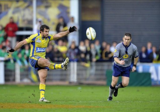 Clermont's fly-half Brock James kicks the ball Clermont's fly-half Brock James kicks the ball