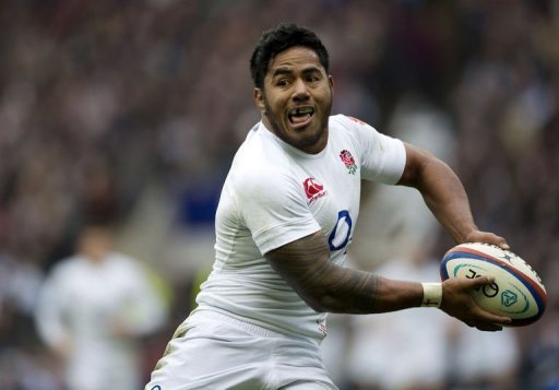 England's Manusamoa Tuilagi prepares to pass the ball England's Manusamoa Tuilagi prepares to pass the ball