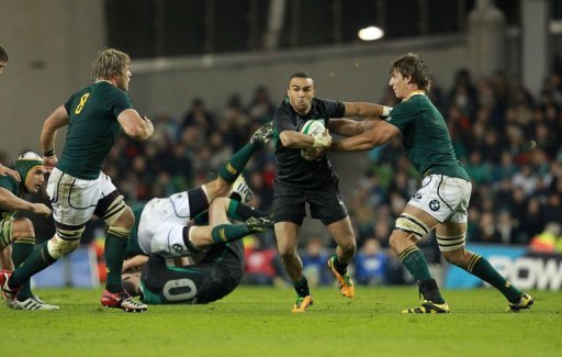 Ireland's full back Simon Zebo (2nd R) hands off South Africa's lock Eben Etzebeth (R) Ireland's full back Simon Zebo (2nd R) hands off South Africa's lock Eben Etzebeth (R)