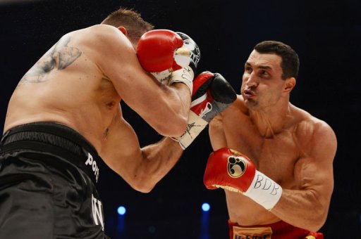 Wladimir Klitschko (R) fights with Mariusz Wach Wladimir Klitschko (R) fights with Mariusz Wach