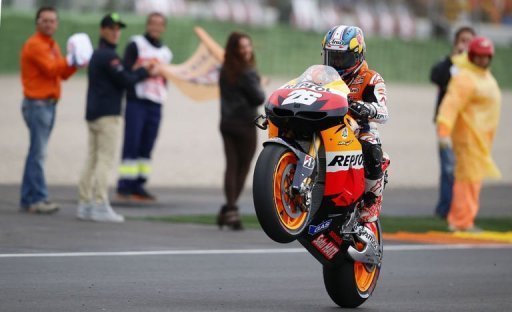 Dani Pedrosa celebrates after winning the MotoGP race at Ricardo Tormo racetrack near Valencia Dani Pedrosa celebrates after winning the MotoGP race at Ricardo Tormo racetrack near Valencia