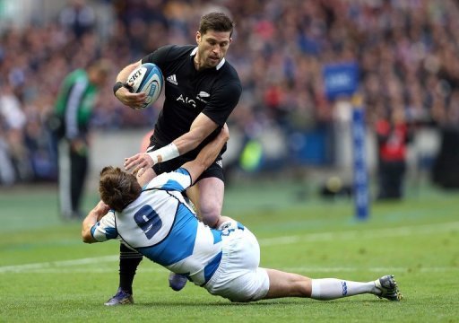 New Zealand's Cory Janes (back) is tackled by Scotland's Mike Blair New Zealand's Cory Janes (back) is tackled by Scotland's Mike Blair