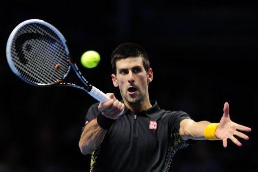 World number one Novak Djokovic, pictured, now faces Roger Federer in the final match of the season World number one Novak Djokovic, pictured, now faces Roger Federer in the final match of the season